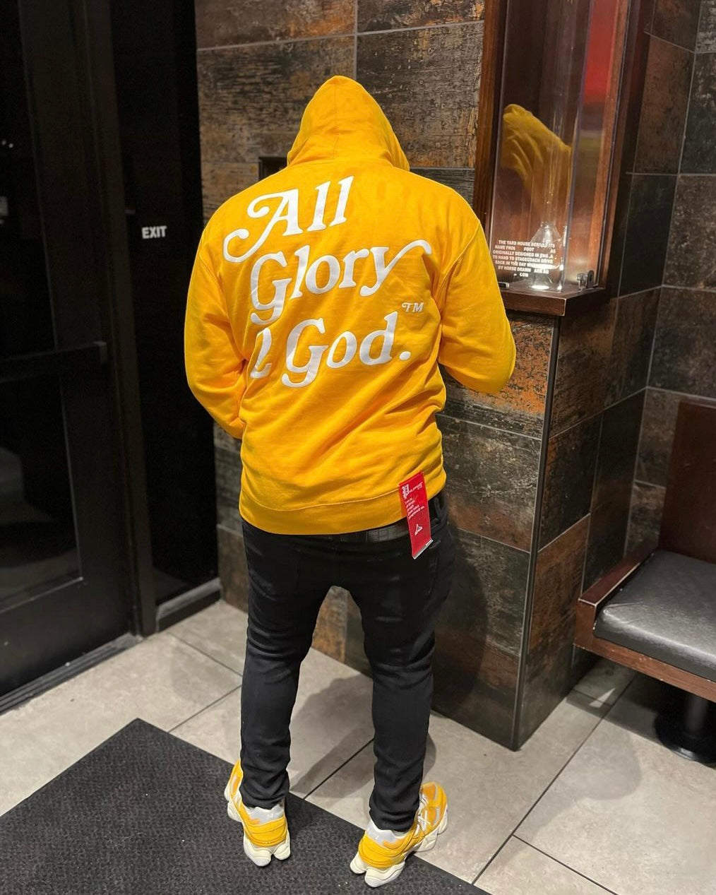 Christian Apparel: All Glory To God ‘Cloud Puff’ Hoodie in Mango Yellow featuring a cloud-inspired design. Perfect for Christian hoodies, Christian streetwear, and Christian athletic wear, blending faith, style, and comfort.