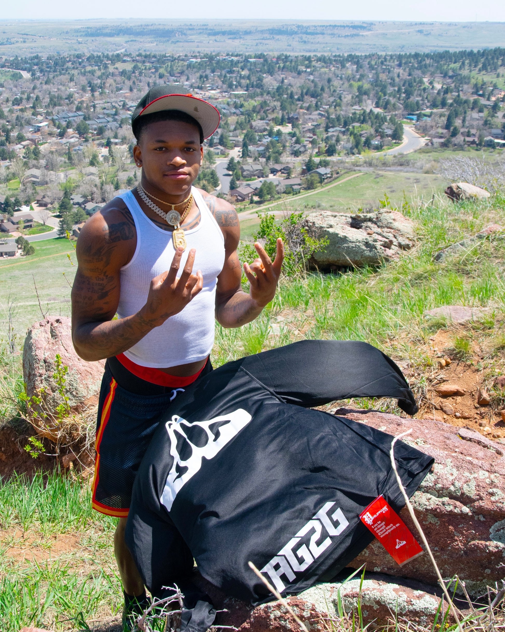 Christian Apparel: All Glory To God ‘Uni’ FlyFit Long Sleeve in Black with football uniform, bold lettering, and Philippians 4:13. Perfect for Christian Long Sleeve T-Shirts, Christian athletic wear, and Christian streetwear.