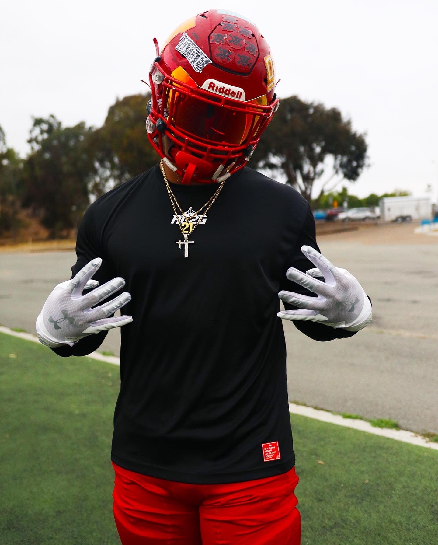 Christian Apparel: All Glory To God ‘Uni’ FlyFit Long Sleeve in Black with football uniform, bold lettering, and Philippians 4:13. Perfect for Christian Long Sleeve T-Shirts, Christian athletic wear, and Christian streetwear.