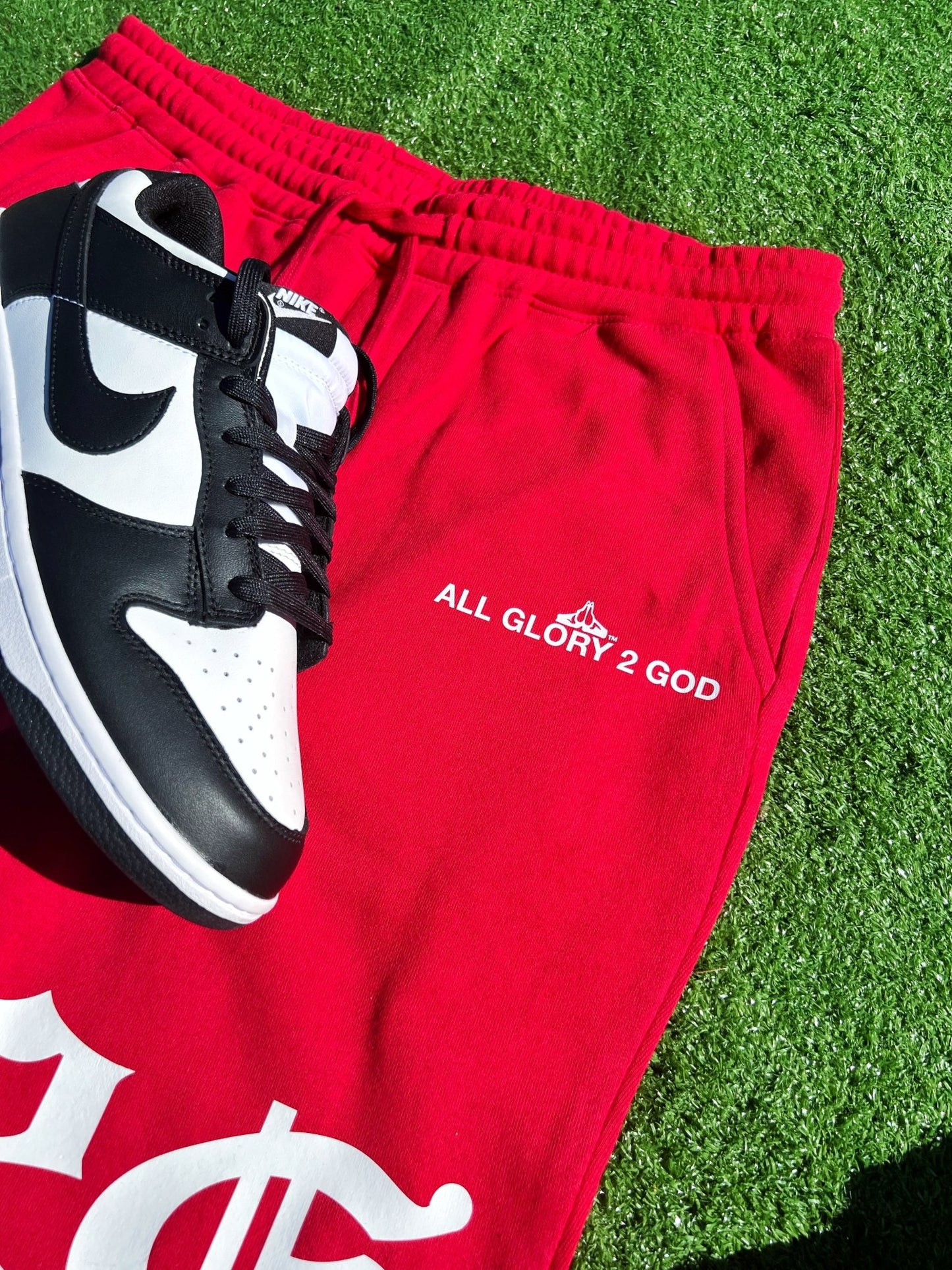 Christian Apparel: All Glory To God ‘Old English KJV’ Fleece Shorts in Red with bold lettering. Great for Christian bottoms, Christian streetwear, and Christian athletic wear.