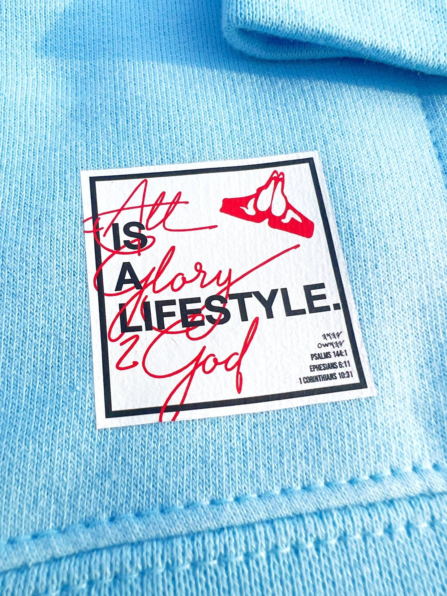 Christian Apparel: All Glory To God ‘Cloud Puff’ Hoodie in Sky Blue featuring a cloud-inspired design. Perfect for Christian hoodies, Christian streetwear, and Christian athletic wear, blending faith, style, and comfort.
