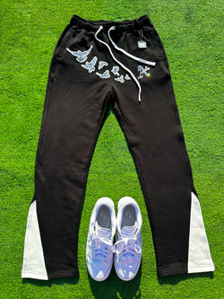 Christian Apparel: All Glory To God ‘Iced Out Flocka Doves’ FlyFleece Flared Sweatpants in Black with dove graphics, bold lettering, and Philippians 4:13. Great for Christian bottoms, Christian streetwear, and Christian athletic wear.
